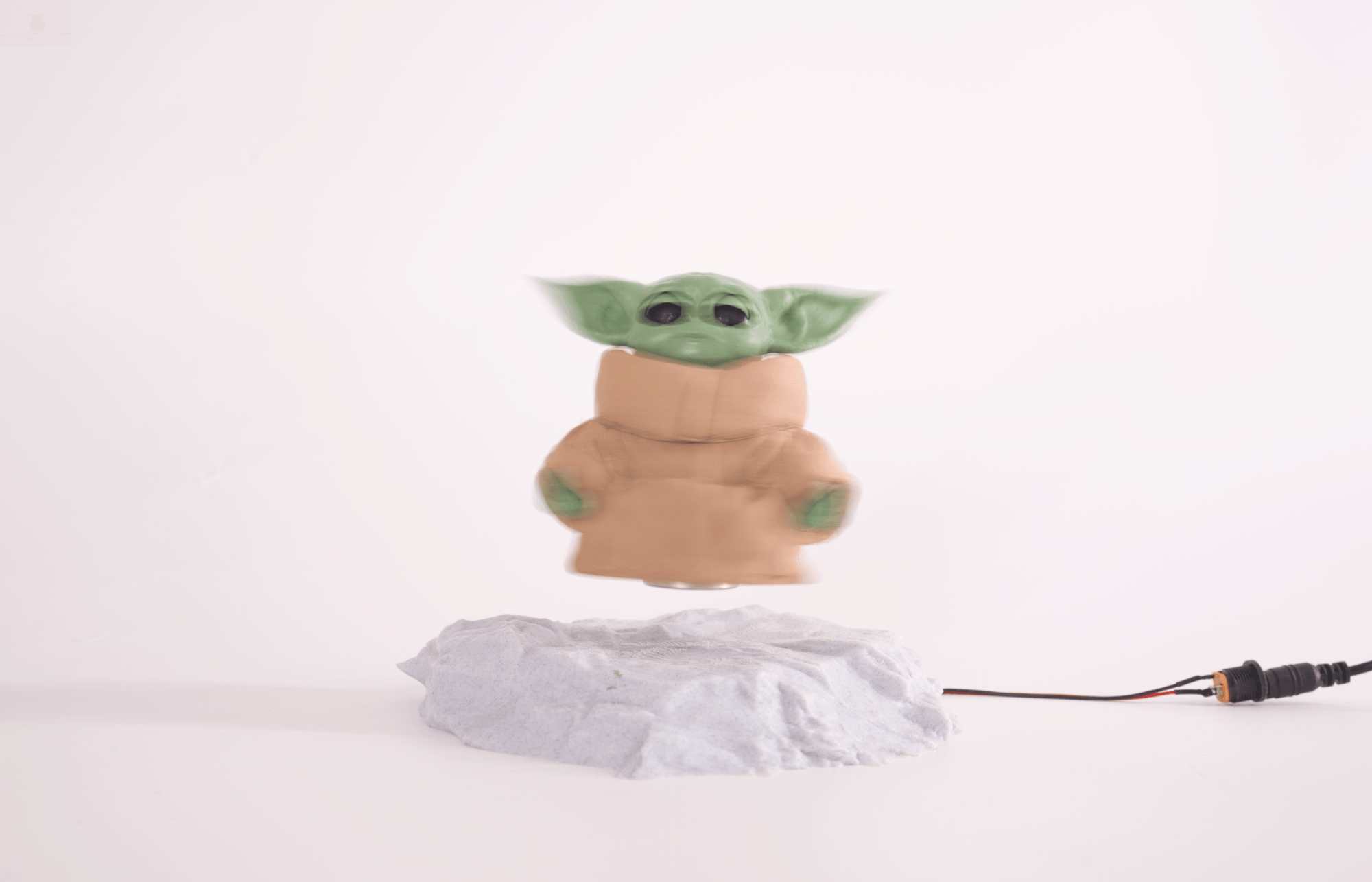 Levitating Grogu